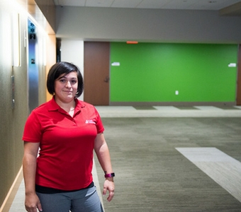 Sarah manages staff and facilities procedures at a client site.