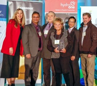 C&W Services, a facilities services company, is honored for its innovative green practices by the Government of Ontario and Energy Into Action