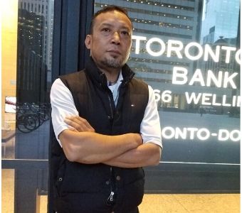 Sonam, a C&W Services employee, takes a photo after saving two people.