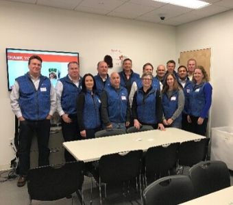 The CW Services Leadership celebrates the Week of Giving in Boston