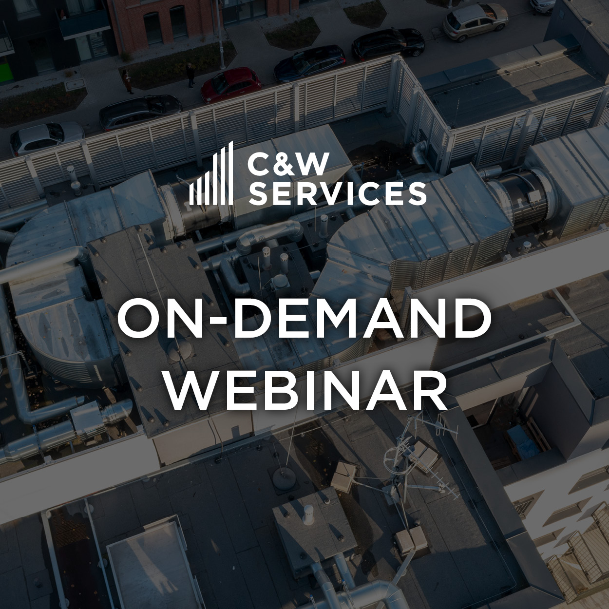 Roof with industrial HVAC systems, overlaid with text: "C&W Services On-Demand Webinar.