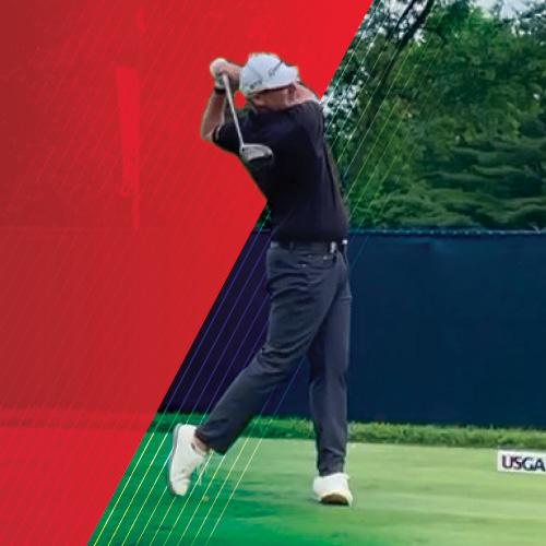 BillAyres backswing against a red backgrund