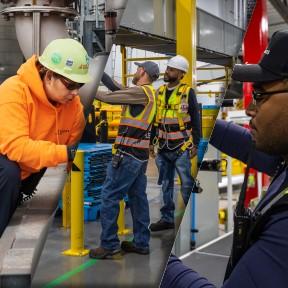 A group of people working in a factory.
