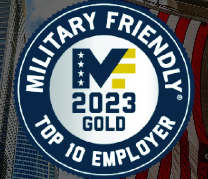 A badge with the words military friendly top 10 employee.