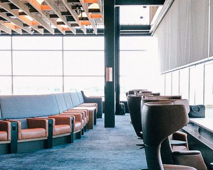 A lounge area with couches and a fireplace.
