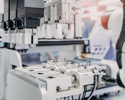 Robot arm holding test tubes in a laboratory
