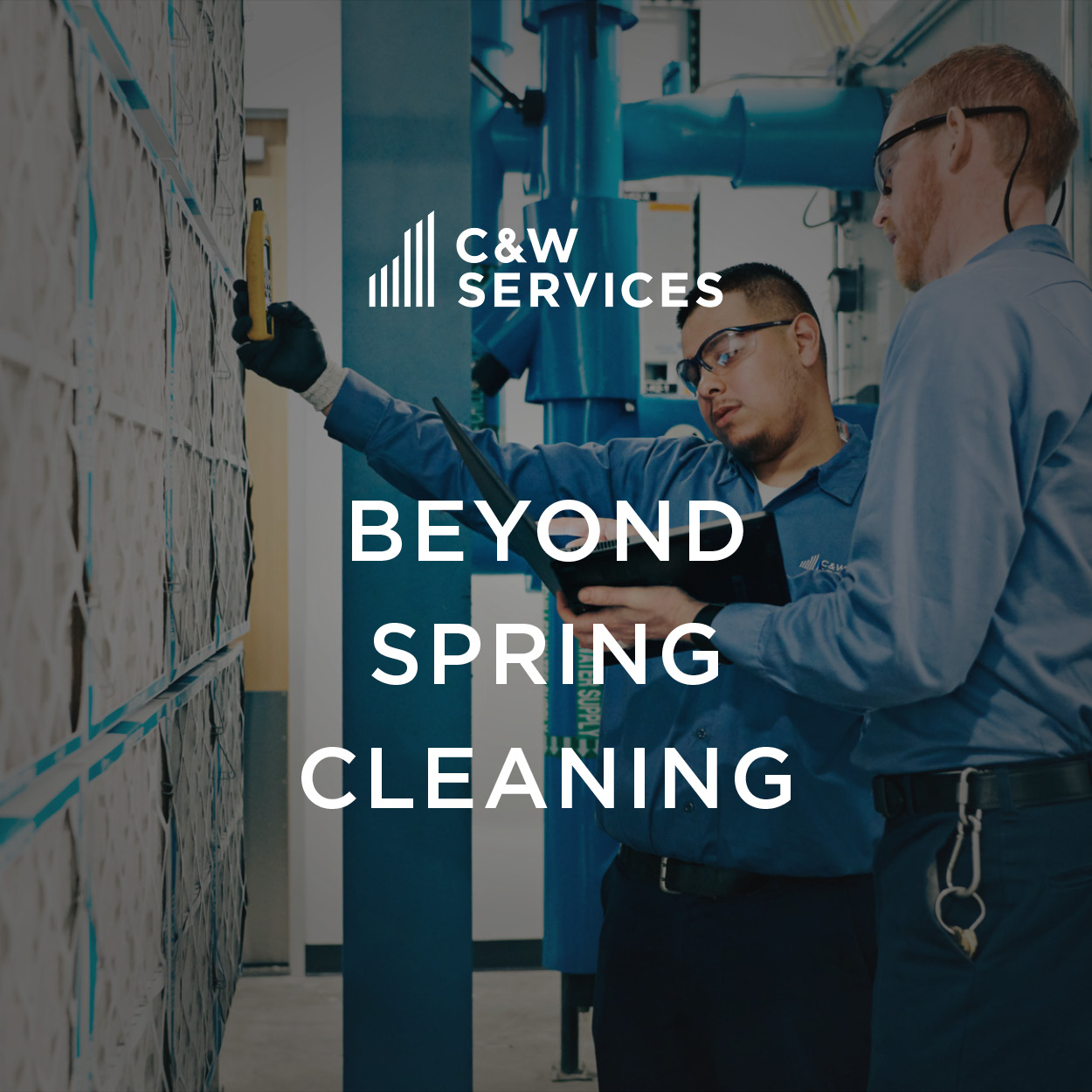 Two workers in blue uniforms inspect equipment, with text overlay: "C&W Services. Beyond Spring Cleaning.